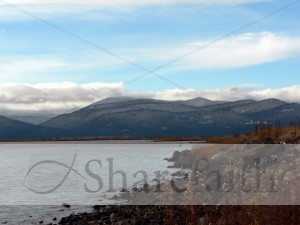 Lakeshore%20with%20Mountains%20and%20Clouds