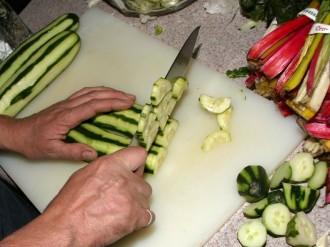Hands Cutting Cucumber