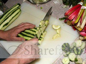 Hands Cutting Cucumber