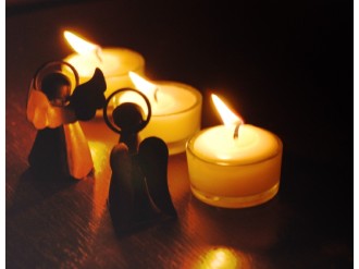 Three Candles and Two Angels