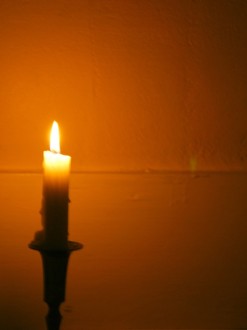 Lit%20Candle%20and%20a%20Reflection