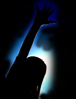 Female%20Praiser%20with%20Black%20Background