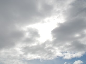 Storm Clouds and Sun Spot