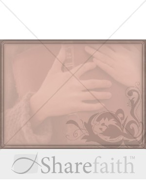 Hands%20Holding%20Bible%20on%20the%20Heart