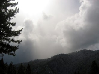 Brilliant Light Shines Through Foreboding Clouds