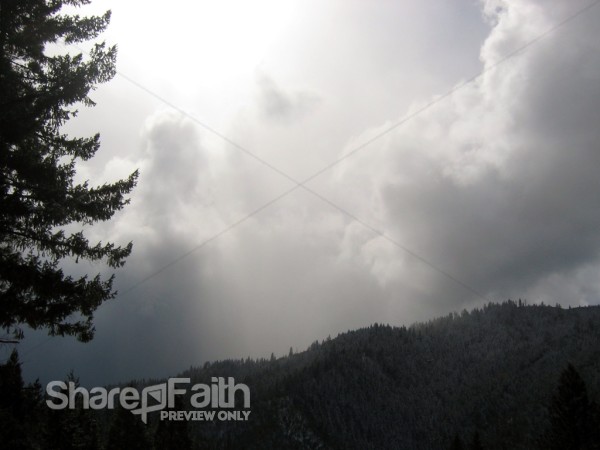 Brilliant Light Shines Through Foreboding Clouds