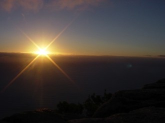 Sun Rising Over Horizon