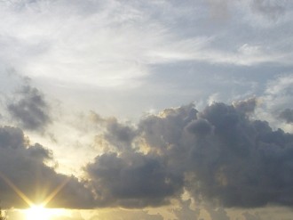 Sunrise Breaks Through the Clouds