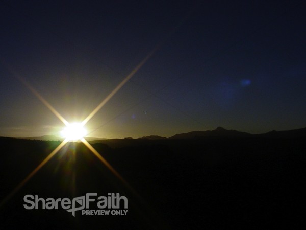 Bright Sun Rising in Dark Sky