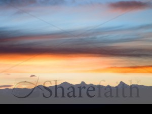 Mountains Silhouetted Against Sunset