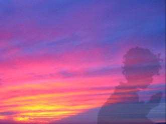 Sunset Clouds with Praying Child Watermark