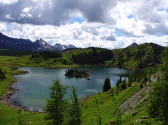 Mountain Lake under a Patchy Sky