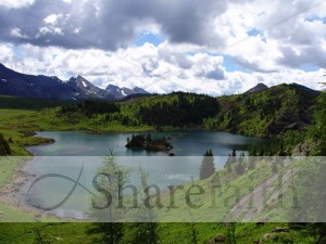 Mountain%20Lake%20under%20a%20Patchy%20Sky