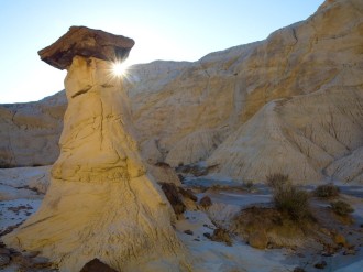 Sun Rising Over Desert Rocks
