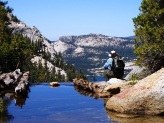 Backpacker by Mountain Stream