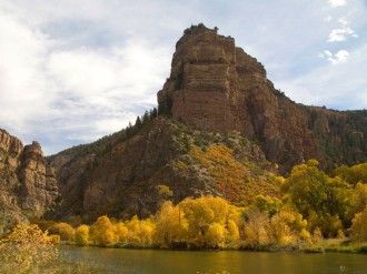 Rocky Cliff Over Lake Photo