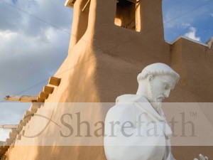 Saint Statue Near Adobe Church